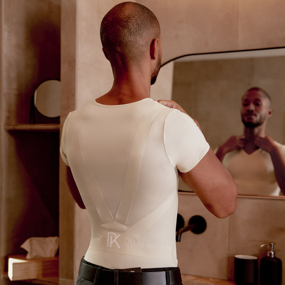 The Percko posture shirt worn under or as a fitted tee, with its tensioned panel visible across the upper back